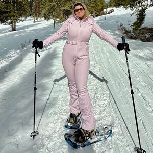 ASOS belted ski suit with kick leg and faux fur hood pink